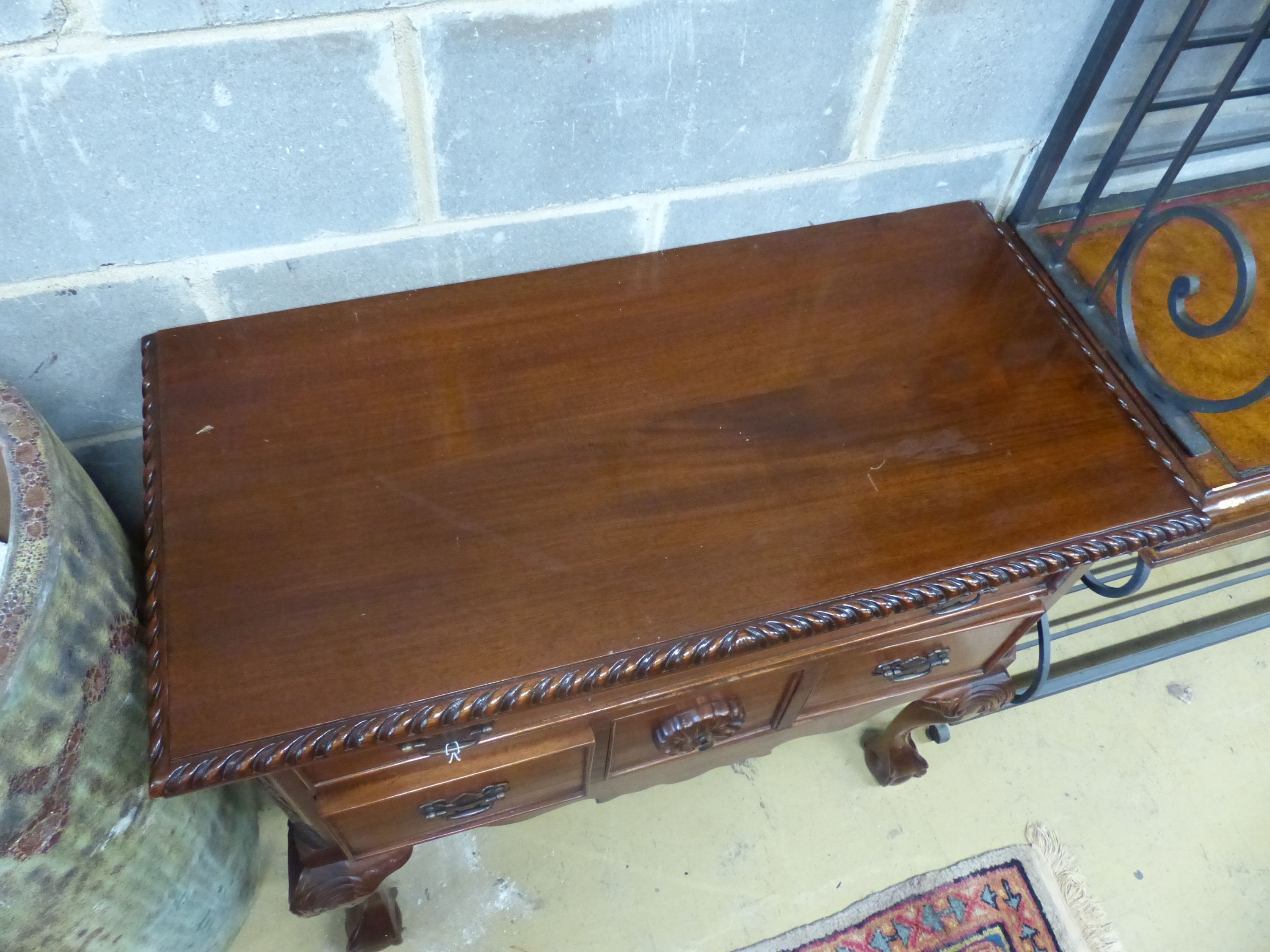 A reproduction George III style mahogany lowboy, width 96cm depth 46cm height 84cm